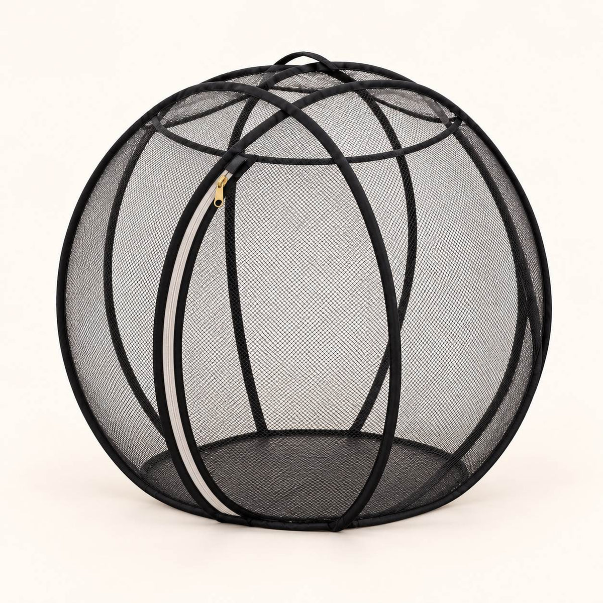 Black mesh pop-up bubble playpen with fabric-covered hoops and a zippered door on a light studio background.
