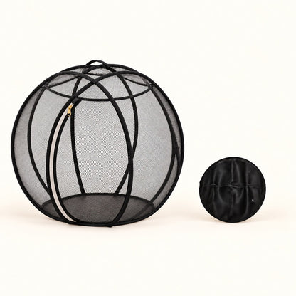 Open black mesh bubble playpen beside its compact folded disc, showing the approximate 70 cm and 30 cm diameters. AI-generated product image.